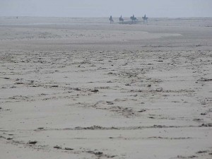 Reiter am Strand