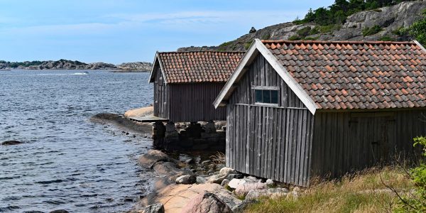 Holzhäuser am westlichsten Punkt Schwedens